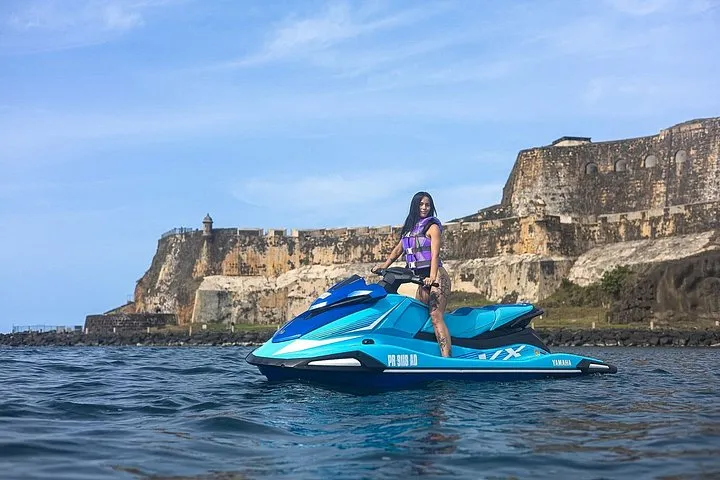 Yamaha WaveRunner riding past the El Morro fortress walls on a jet ski rental in Puerto Rico